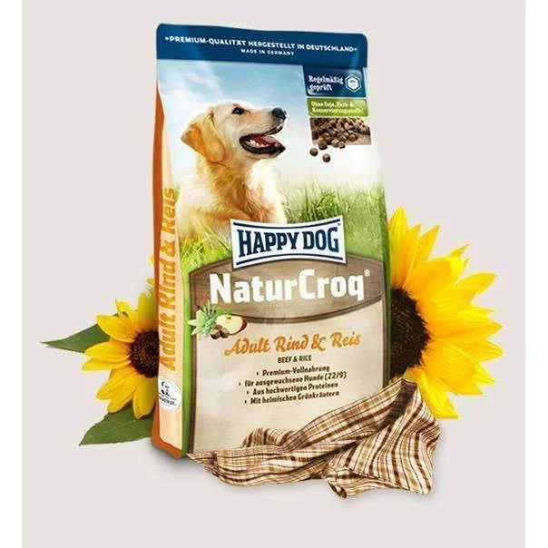 10. **Dog bathing brush massage**Happy Dog Premium - NaturCroq  Beef & Rice - 1kg